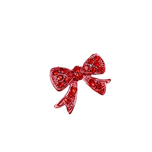 Elegant red rhinestone bow brooch with metal base for suits, high-quality jewelry piece