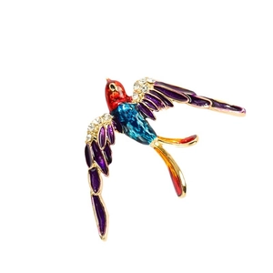 Broche oiseau exquise avec émail coloré et strass scintillants pour femme