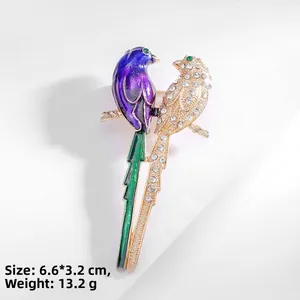 Detail shot of vintage twin bird brooch with crystals and enamel, 6.6*3.2cm size