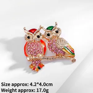 Vintage owl brooch with colorful enamel and pink crystals in high-quality gold plating