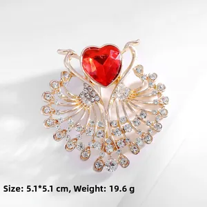 Detail of peacock brooch with heart ruby and white crystals, 5.1x5.1cm size