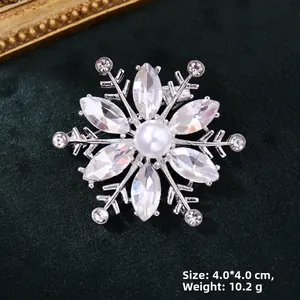 Detail of snowflake brooch with crystals and pearl on velvet, 4.0x4.0CM 10.2G