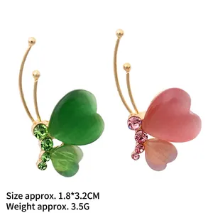 Exquisite butterfly clover brooch with cat eye stones and sparkling rhinestones