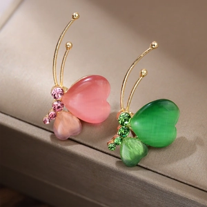Exquisite gold-plated butterfly brooches with pink and green heart-shaped gemstones