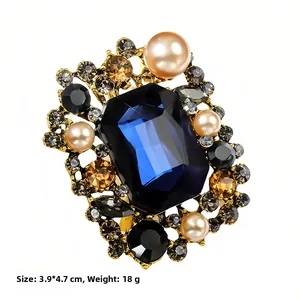 Detail view of a luxury vintage brooch with blue stone, pearls, and crystals, size 3.9*4.7cm
