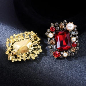 Vintage luxury alloy brooch with emerald-cut red crystal, pearls, and gold finish
