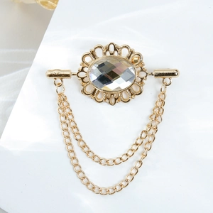 Vintage gold brooch with oval crystal and elegant tassel chains for blazer or shirt