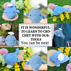 Detail view of handmade crochet blue whale plush with fountain flower and backpack charm use