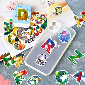 Creative graffiti stickers displayed on a phone case and magazine with artistic patterns