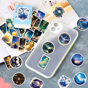Stickers with celestial star and moon patterns applied on a clear phone case detail