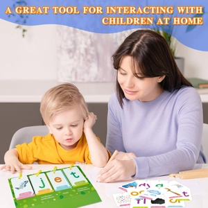 Macro shot of educational phonics flip chart showing letter cards and vowel sorting