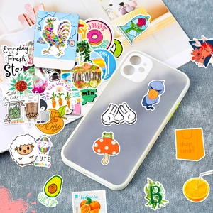 Macro view of fresh orange stickers applied on a frosted phone case with vivid colors