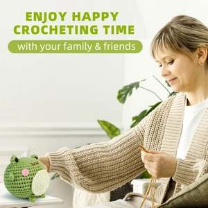 Close-up of DIY crochet green frog kit showing detailed texture and handmade process