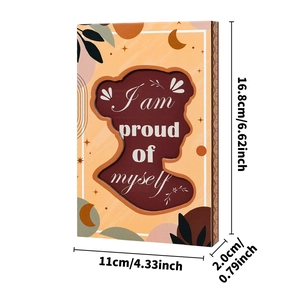Décoration en bois avec silhouette artistique et citation inspirante sur fond blanc