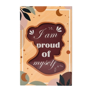 Gros plan d'une couverture de carnet style bohème avec silhouette et citation inspirante