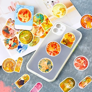 Detailed close-up of Art Nouveau stickers featuring Alphonse Mucha designs on a phone case