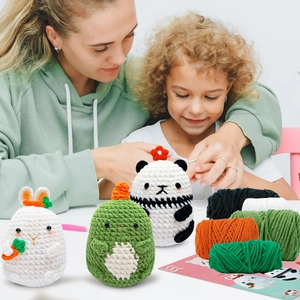 DIY crochet kit for beginners featuring three cute amigurumi animal plush toys and yarn