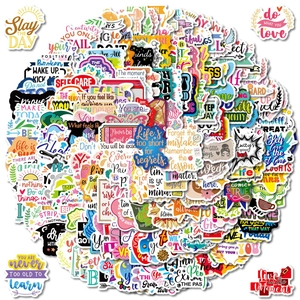 Close-up of inspirational quote stickers with colorful floral and vinyl finish designs