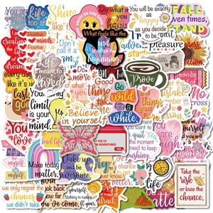 Detail view of colorful inspirational quote stickers and artistic vinyl DIY decals