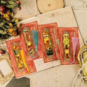 Retro hollow metal bookmarks with vintage illustrations and colorful silk tassels