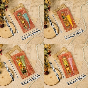 Vintage hollow metal bookmarks set with silk tassels in retro Nordic baroque design style