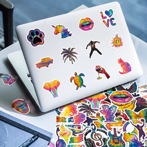 Vibrant graffiti stickers with colorful animal patterns on a white laptop cover