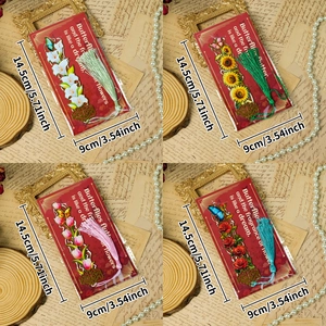 Detailed views of floral hollow metal bookmarks with matching silk tassels in set