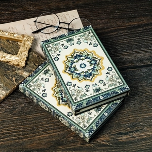 Retro mandala pattern hardcover notebook set with magnetic hollow design on wooden desk