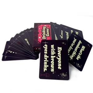 Close-up of Drinking Game cards with interactive English prompts and red packaging