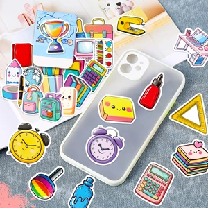 Close-up of cute cartoon stationery stickers applied to a transparent phone case for DIY
