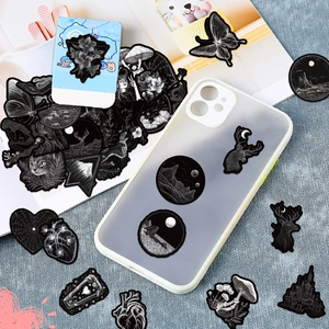 Gothic black and white vinyl stickers applied on a transparent phone case decoration