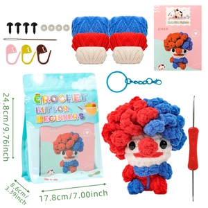 Clown crochet kit with yarn, tools, and finished doll shown on white background
