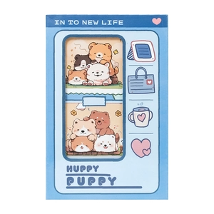 Close-up of cute HUPPY PUPPY blue notebook featuring cartoon dog and bear illustrations