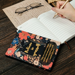 Floral tri-fold notebook with magnetic buckle and Believe in Yourself gold quote
