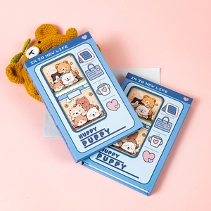 Detail view of cartoon dog illustration and cutout design on blue hardcover journals