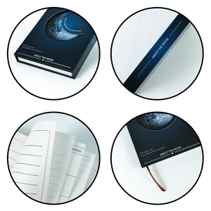 Detail view of starry sky notebook with crescent moon cover and ribbon bookmark