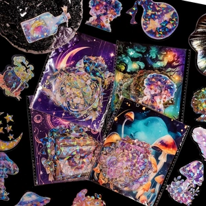 Close-up of laser fairy tale stickers with holographic mushroom and magic potion designs