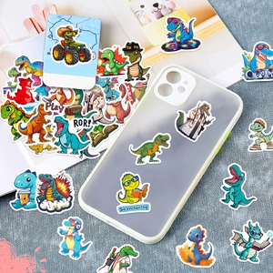 Close-up of waterproof cartoon dinosaur stickers on a transparent mobile phone case
