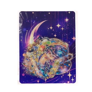 Detail of fairy tale owl sticker in cup with laser foil finish and starry night design
