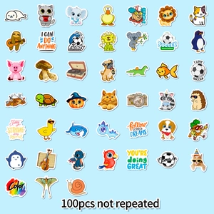 Detail showing various 4cm cartoon animal stickers and cute decorative items on blue background