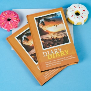Romantic beach theme diary set with orange hardcover and sunset cover illustration