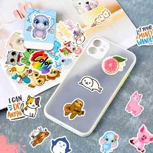 Cute cartoon animal and motivational quote stickers on a phone case and notebook