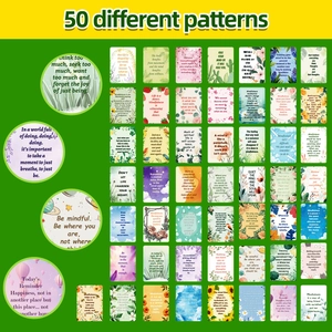 Close-up of 50 floral mindfulness cards with inspirational quotes and artistic patterns