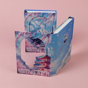 Detail of multi-layer hollow 3D Mount Fuji and cherry blossom design on notebook cover