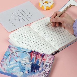 Detail of Mount Fuji notebook featuring cherry blossom cover and lined dotted inner pages