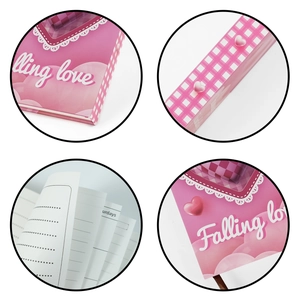 Detail showing pink graffiti heart notebook cover with Falling Love text and lace trim