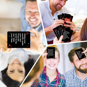Close-up of Couple Game interactive cards with red hearts and English romantic instructions