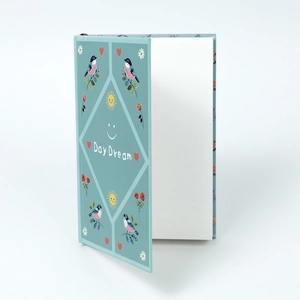 Light blue Day Dream journal with floral illustrations and white blank pages
