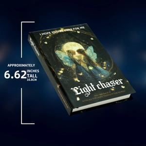 Detail view of fantasy fairy hardcover notebook showing 6.62 inch height and artistic spine