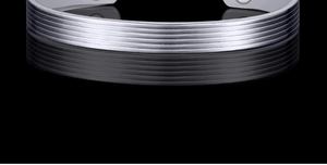Macro detail of silver magnetic therapy bracelet with inset magnets on inner surface